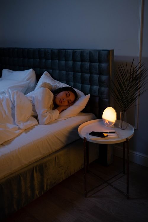 Woman sleeping peacefully — overnight muscle recovery and amino acids
